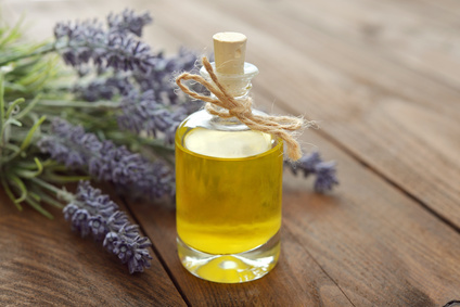 Lavender essential oil with lavender flowers