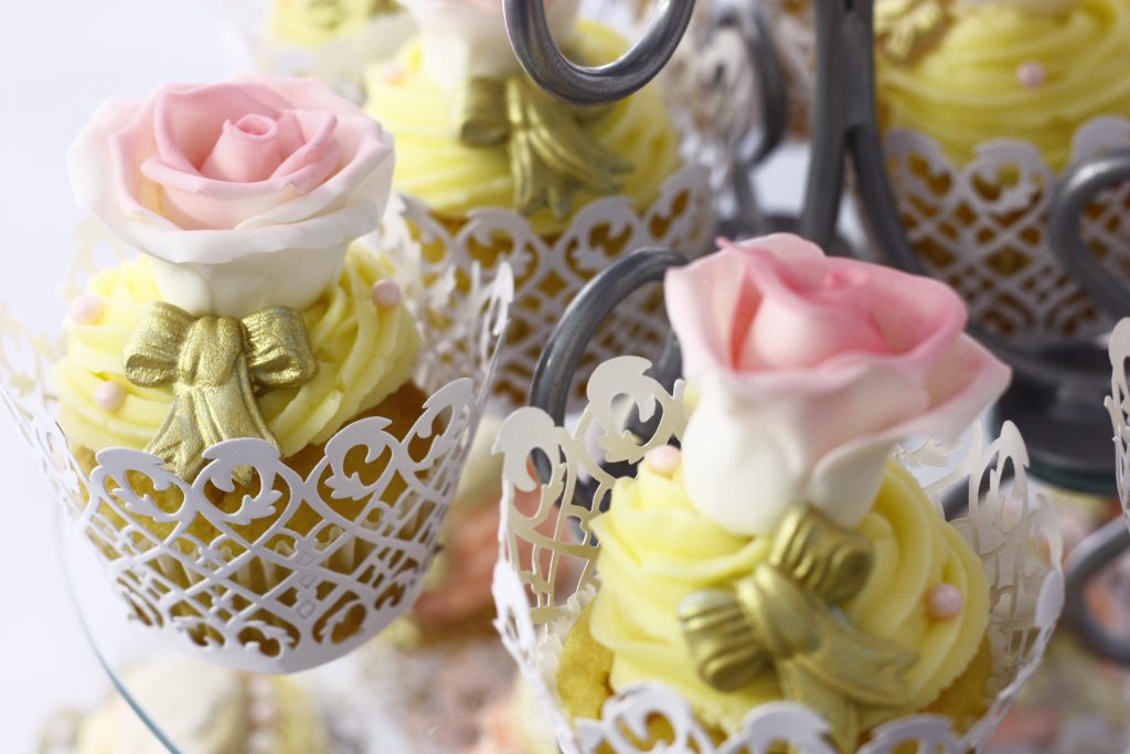Cupcakes with pretty yellow and pink frosting